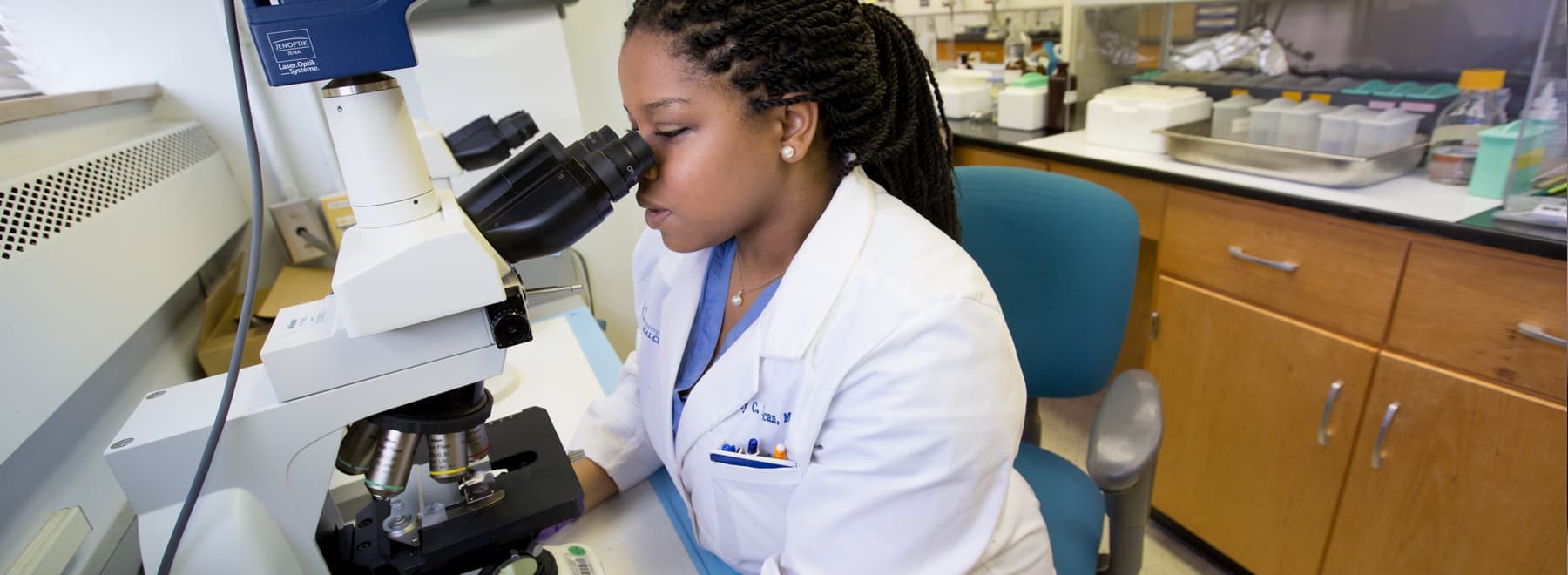 Pathologists examine specimens